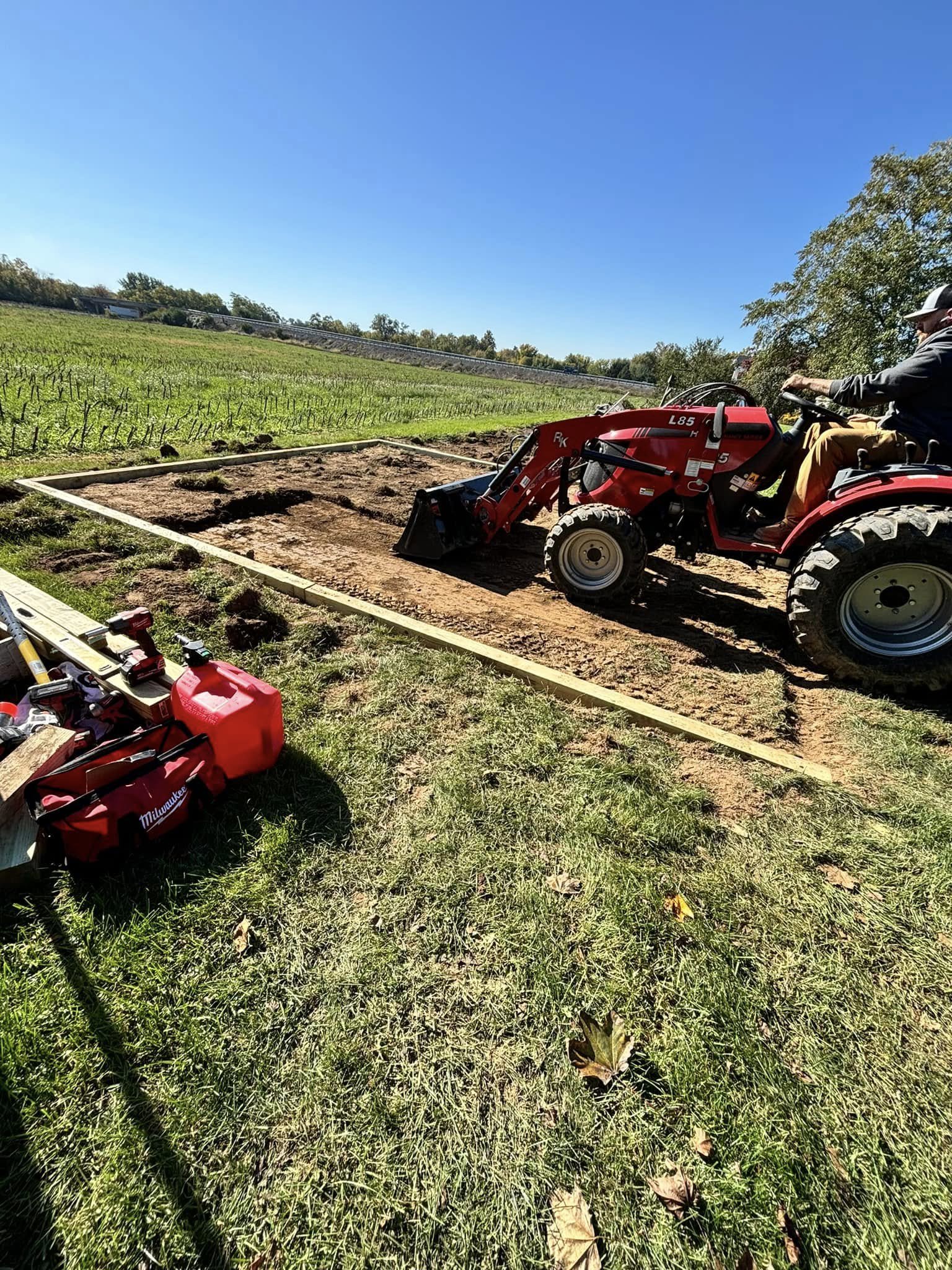 Tractor working dirt at a residential construction site